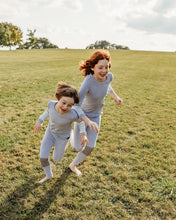 Load image into Gallery viewer, Derived from renewable wood sources, TENCEL™ cellulosic fibers gently embrace your body with long-lasting softness to help your skin feel pleasantly cool and dry throughout the day and night. As a result of the smooth fiber surface, TENCEL™ cellulosic fibers offer an exquisitely gentle quality that creates a barely there feel.